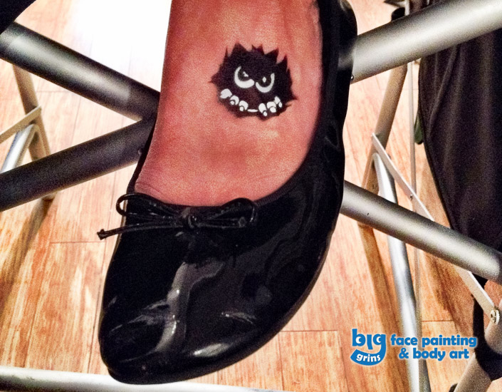 Big Grins Airbrush Temporary Tattoo of Little Monster for Grand Opening Celebration